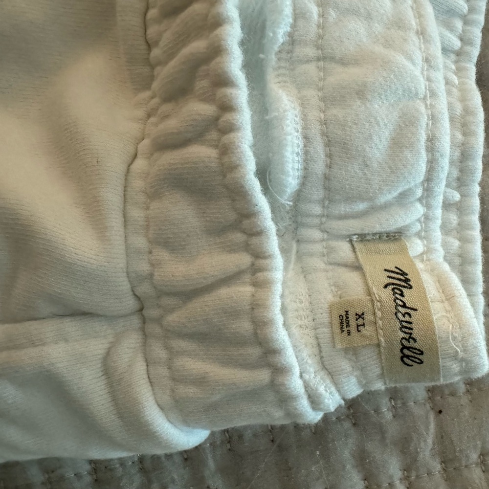 Cream background with tie dye leg. Madewell brand